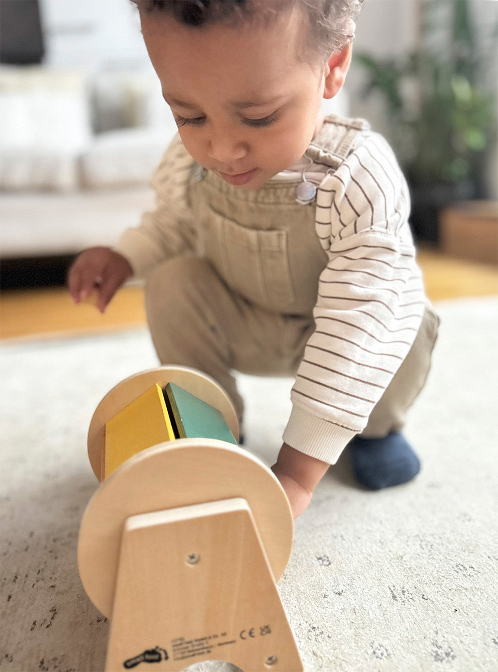 Tobă Rotativă Montessori – Jucărie din Lemn Certificat FSC cu Bilă Sonoră, 5 Fețe Colorate, pentru Bebeluși, Sunet și Mișcare